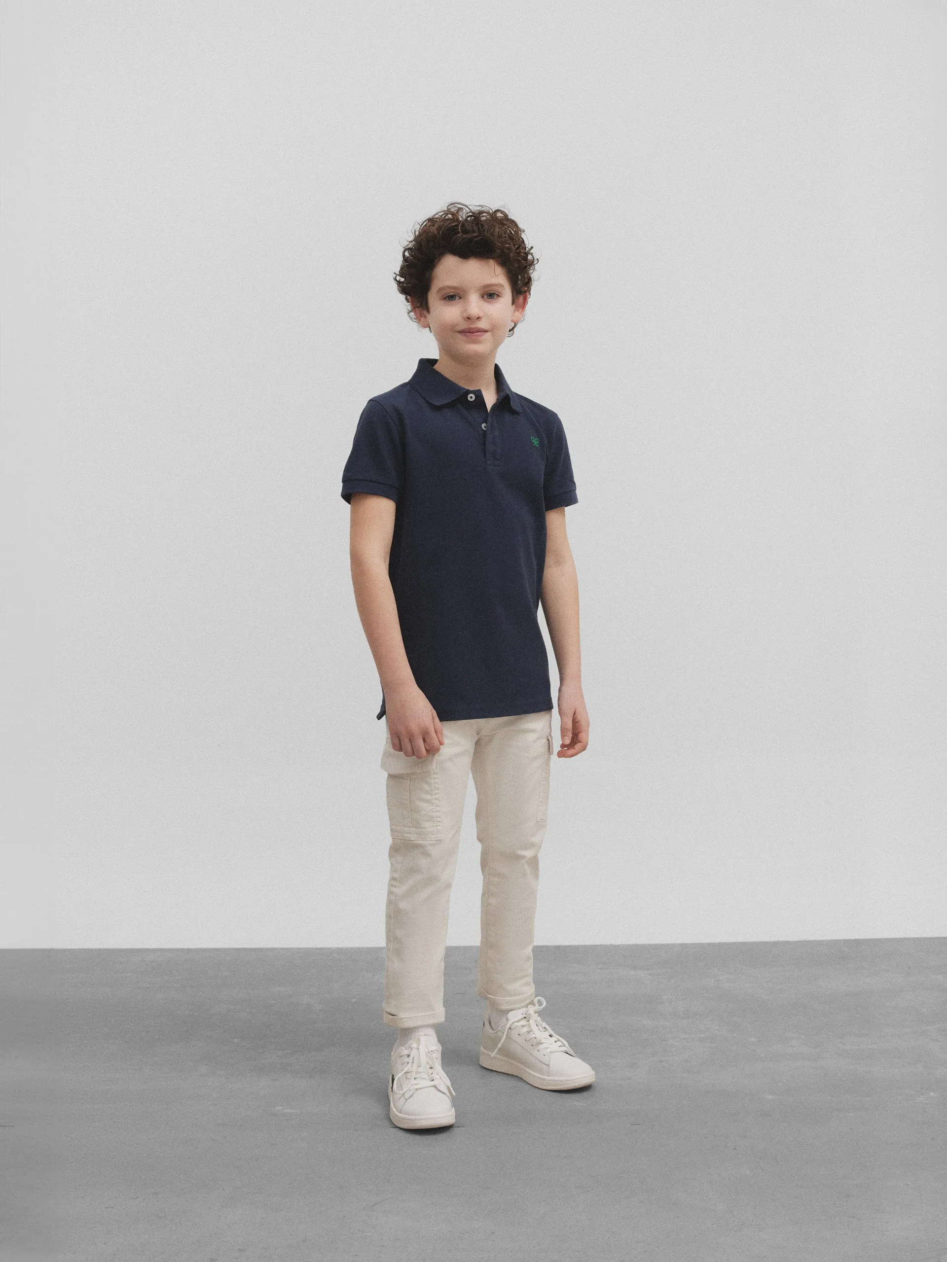 Polo kids raqueta trasera betis azul marino