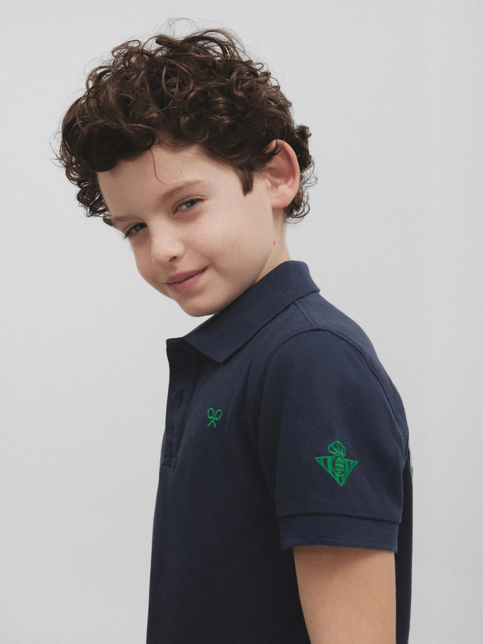 Polo kids raqueta trasera betis azul marino